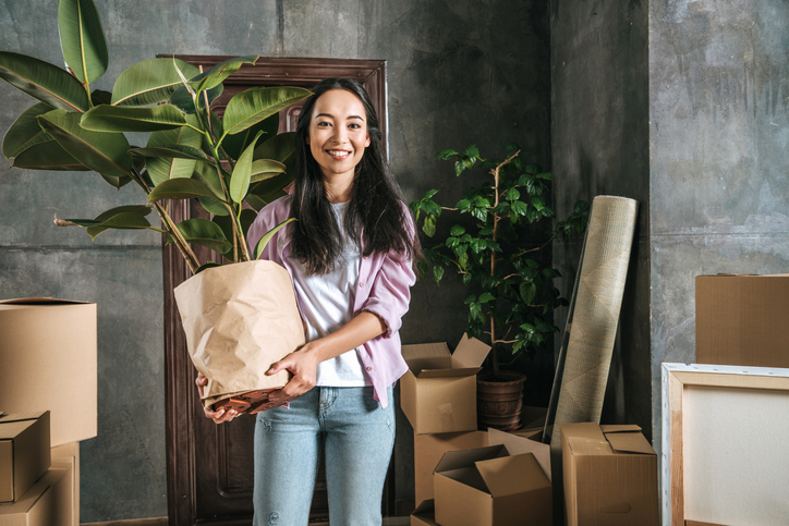 Woman moving into a new home